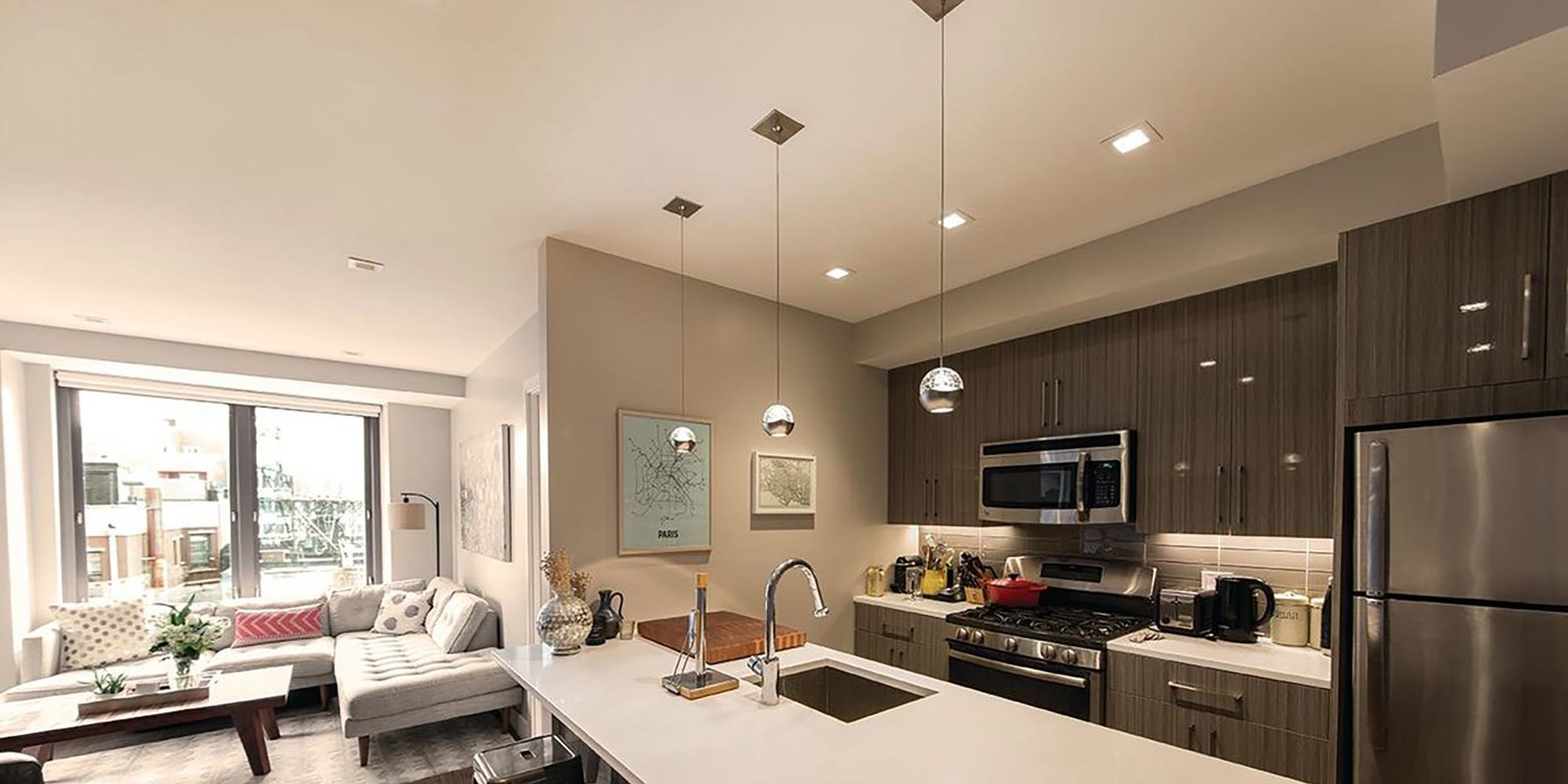 WAC Lighting pendant lamps installed in a residential kitchen