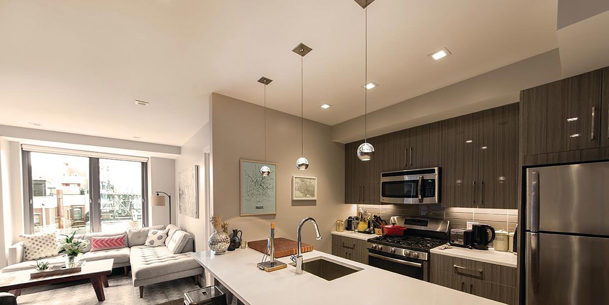 WAC Lighting pendant lamps installed in a residential kitchen