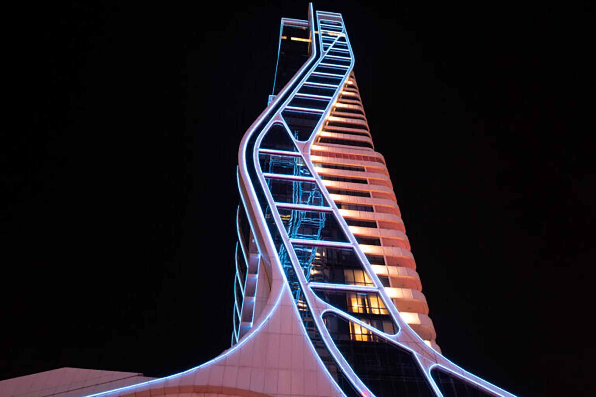 RGBW lighting illuminates the side of a building