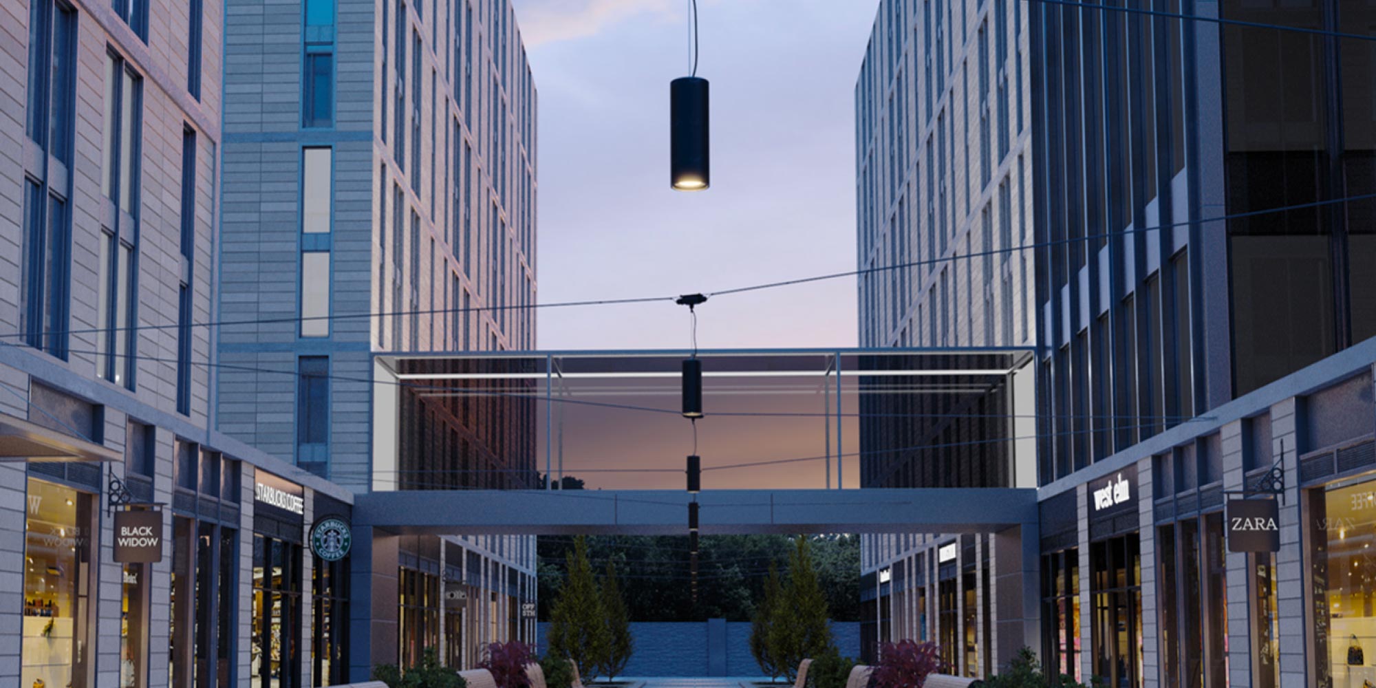 Catenary Lighting installed over a shopping complex courtyard